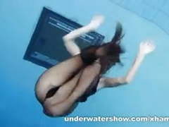 TitsCult presents: Zuzanna is swimming in pantyhose in the pool