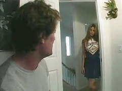 TitsCult presents: Cheerleader gets it on couch.
