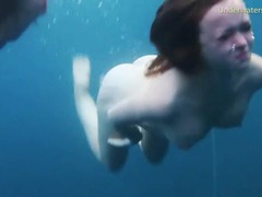 TitsCult presents: Sexy naked girls swimming in the ocean