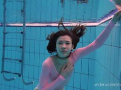 TitsCult presents: Leggy girl goes swimming in her leotard