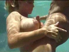 TitsCult presents: Chick swallows his cock underwater