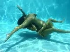 TitsCult presents: Lesbian sex underwater looks amazing