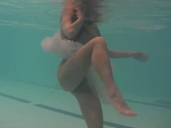 TitsCult presents: Sheer white dress on a teen swimming in the pool