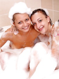 TitsCult presents: Naughty sexy young chicks taking a hot bubble bath together