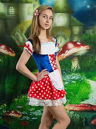 TitsCult presents: Very hot blonde teen beauty in an adorable outfit slowly takes it off to reveal her nice and perky boobs