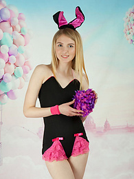 TitsCult presents: This tight blonde bunny has some smoking hot fun with stripping her clothes and playing with her flower