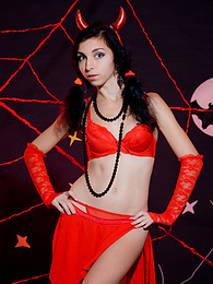 TitsCult presents: Only one look in the eyes of this fantastic slim teen will tell that she is a little devil inside. No further costume is needed.