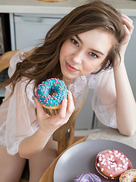 TitsCult presents: If you are a fan of skinny girls, check out how this cute little doll poses and teases totally naked in the kitchen.