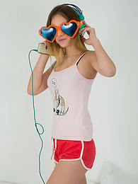 TitsCult presents: This doll really knows how to have fun with her and how she can show off her pussy and listen to some beats at the same time.