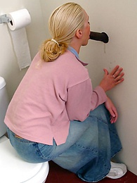 TitsCult presents: Blonde girl Jamie sits on the toilet and blows a black gloryhole dong