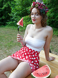 TitsCult presents: Nice belarusian stunner Rokki removes all clothes on a blanket in a backyard