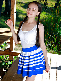 TitsCult presents: Fresh-Faced russian beauty Mia Grandy gets totally naked on a picnic table in a garden
